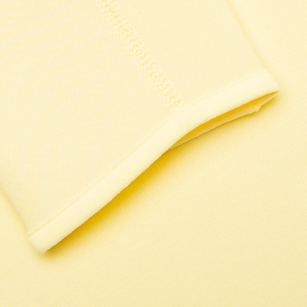 NOCTA Tech Fleece Crew - Citron Tint/Vivid Sulfur